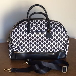 Vera Bradley tote bag with storage compartment